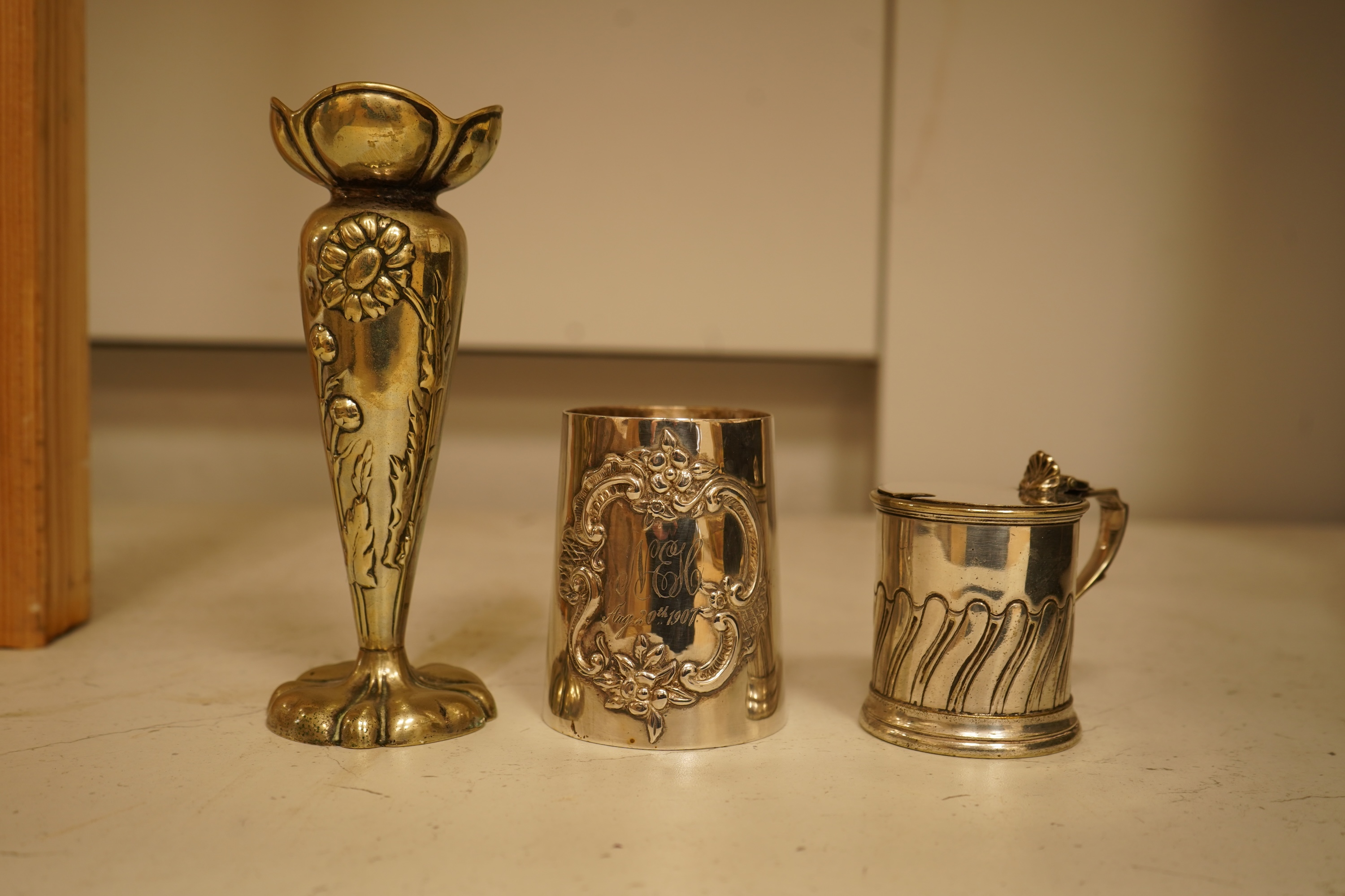 A quantity of assorted plated wares including a pair of 19th century wine coasters, antimony box, toast rack and flatware.